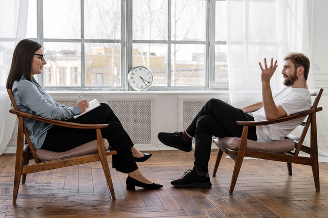 two person talking image